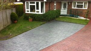Platinum Grey Ashlar Slate with Brick Red London Cobble Printed Concrete Driveway
