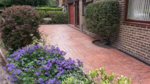 Brick Red London Cobble Printed Concrete Driveway with Compass Feature