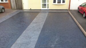 Platinum Octagon Tile and Charcoal Cheshire Cobble Printed Concrete Driveway