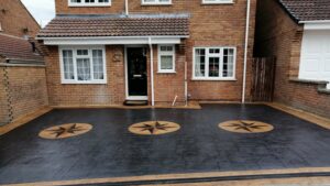 Printed Concrete Driveway in Casesar Stone with Cobble Star Feature